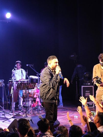 Ash King and Nikhil Paul George collaborating on stage for a unique show at Hallucia, AIIMS Nagpur.