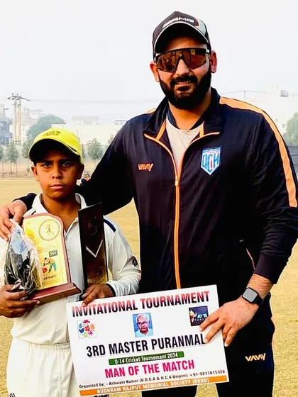 Celebrating our U-14 team's victory in the 3rd Master Puranmal Cricket Tournament. Here I am with Aarush, the Man of the Match, a well-deserved award for his performance.
