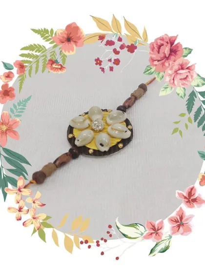 A collection of beautiful handmade Rakhis, created using different materials like thread, shells, paper quilling, and natural fibers. Join our workshops before Raksha Bandhan to make your own.