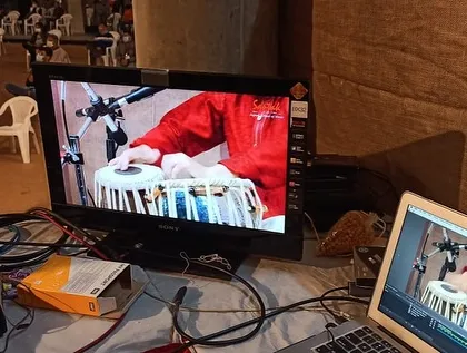 A close up on the monitor showing my hand movements during the Saptak Music Festival performance. The clarity of each 'bol' is essential in classical tabla.