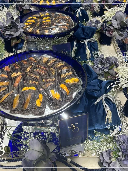 Each Azure Crystal Bowl is filled with premium treats, making the gift both beautiful and indulgent. This is a perfect thank you for guests attending a wedding celebration.
