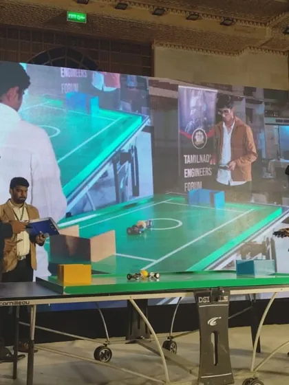Our student in action, controlling his robot during the INNOEX competition. These high-stakes events are a fantastic way for students to apply their knowledge under pressure and innovate on the fly.