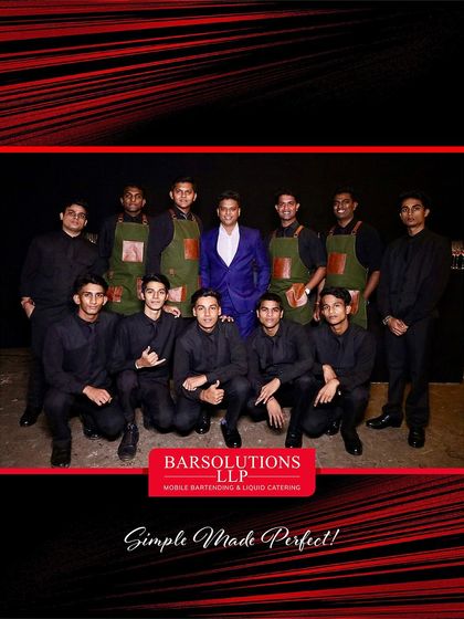 The full team, standing and kneeling, that elevated the Outhouse Jewellery Fashion Show with flawless bar service.