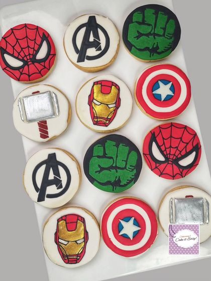 Avengers assemble! These royal icing cookies feature the logos and symbols of favorite superheroes. The clean lines and bold colors make them a hit for any comic book fan's party.