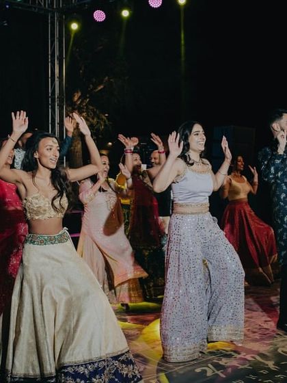 The dance floor was alive with energy as guests joined the couple for a choreographed performance at the Sangeet.