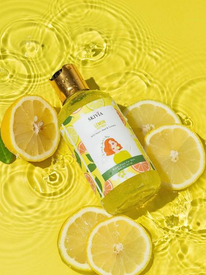 We love playing with water ripples. This shot places the lemon body wash in a pool of water, using the ripples to create texture and movement. The bright yellow background makes it feel like sunshine in a bottle.