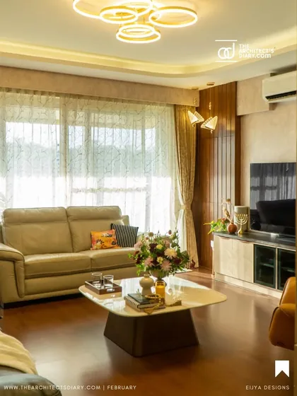 Inspired by Korean minimalism, this living and dining area uses a calm, neutral palette with clean lines and geometric patterns on the wall. The focus is on creating a serene and uncluttered environment with sophisticated lighting.