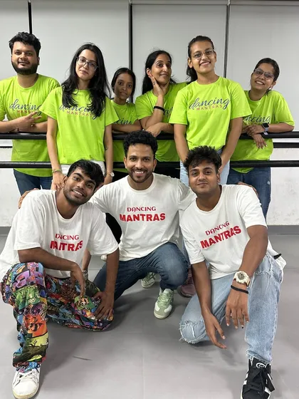 The full 'Rule Breakers' team with their instructors, a powerhouse of talent ready for the showcase.