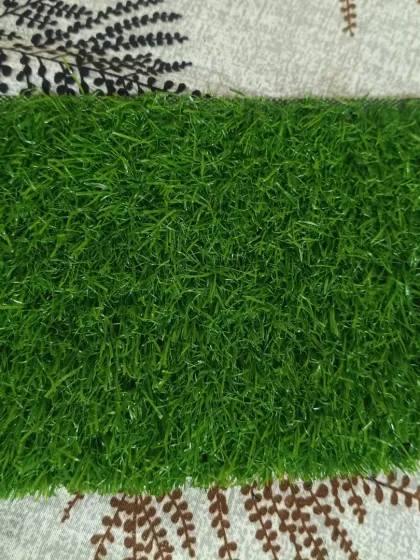 A detailed look at the 30mm artificial grass with double backing. This turf is durable and provides a neat, trimmed-lawn appearance that is easy to clean.