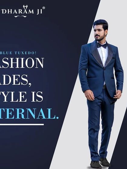 A classic navy blue tuxedo. As the image says, "Fashion fades, style is eternal," and this look is a perfect example of enduring style.