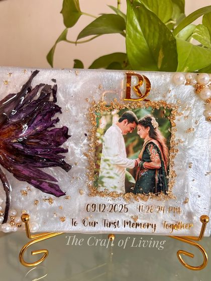 Another angle of the preserved lotus frame, highlighting the deep purple of the flower against the pearlescent white background. This shows how the natural colors of the flowers are maintained through the preservation process.
