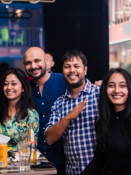 A happy group posing for a photo. It's a great place to meet new people and hang out with friends.
