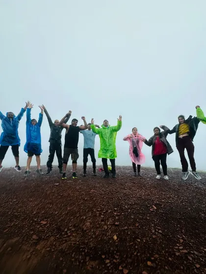A fun group jump shot on a hilltop during the Kodachadri trek.