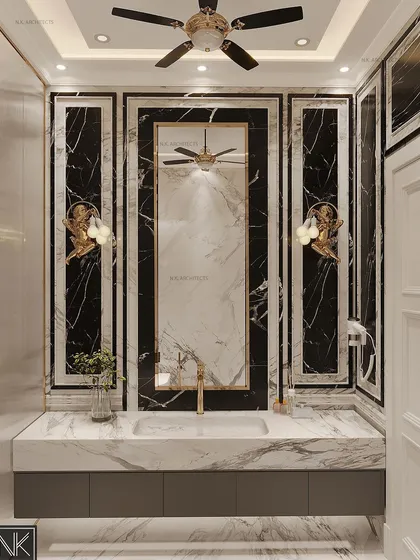 A stunning washroom we designed and executed, capturing a neo-classical vibe with elegant wall mouldings and a mix of black and white marble. Every detail, from the vanity to the shower partition, reflects our client’s desires.
