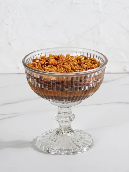 A single serving of my Chocolate & Salted Caramel Trifle, topped with crunchy praline. It's one of the four flavors in my assorted gift box.