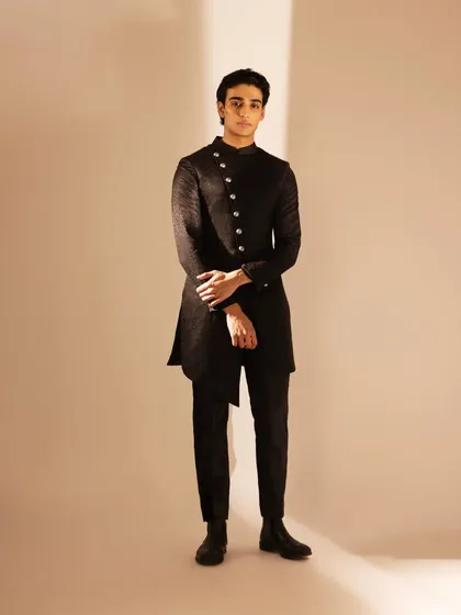 Makeup for men is about enhancing features for the camera. For this professional shoot, I created a clean, natural look focusing on perfect skin and subtle definition to ensure the model looked his best.