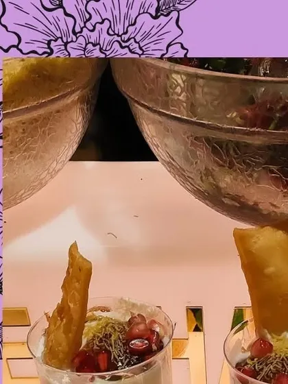 A close-up of our Bhalla Papdi, served in individual portions. We believe this dish is a work of art, requiring a relentless pursuit of culinary excellence to achieve the perfect balance of flavors.