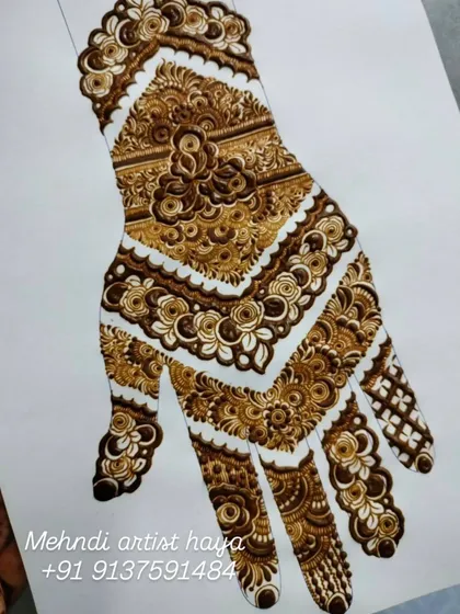 A close-up view of the bridal practice sheet, focusing on the wrist and finger details. Notice the clean lines and consistent spacing, which are the fundamentals of professional henna art.