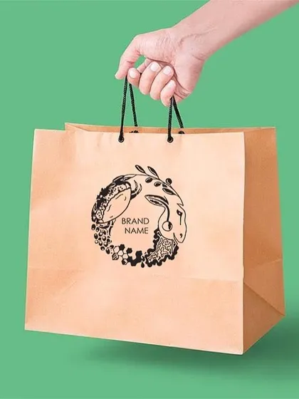A brand's identity extends to its physical presence. This is a sample of sustainable packaging, a shopping bag made from FSC certified recycled heavy paper, demonstrating my commitment to creating eco-friendly brand assets without compromising on quality.