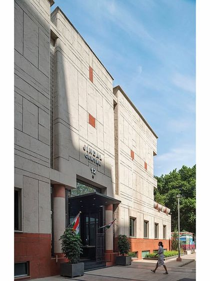 The restored façade of the Jindal Centre, also known as The Layered Office, where we repaired the Dholpur stone and updated the entrance for a timeless, stately appearance.