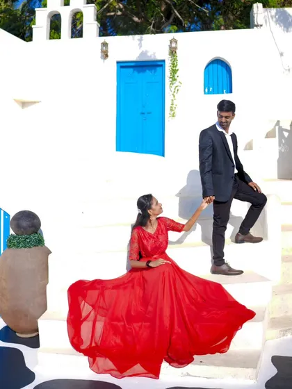 A playful and romantic moment on the steps. We capture both posed and candid shots to tell your complete love story.
