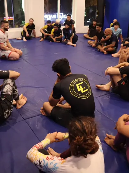 The room is packed for Day 1 of the seminar. Everyone is focused on the details as Professor Mike breaks down a technique.
