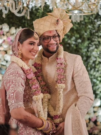A beautiful candid portrait of the couple during their wedding ceremony, sharing a quiet moment of connection.