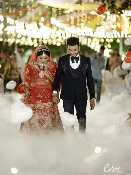 Making a grand entrance at the reception. I use special effects like this low-lying fog to create a dramatic, movie-like atmosphere for your big moments.
