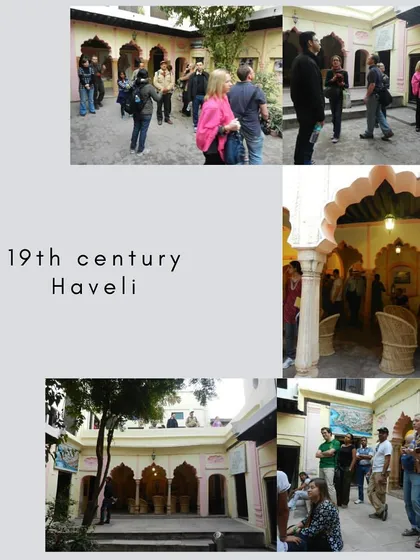 Participants admiring the architecture of a 19th-century haveli in Old Delhi. These traditional mansions with their central courtyards offer a peaceful respite from the busy streets and a glimpse into a bygone lifestyle.