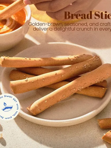 A satisfying crunch in every bite. My golden-brown Bread Sticks are perfectly seasoned and make a versatile addition to any festive spread, great for dipping or enjoying on their own.
