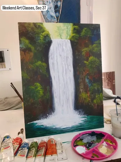 A gorgeous waterfall painting created with acrylics on canvas by Harinder ma'am. This piece was mentored by our instructor, Sajal Bhangalia.