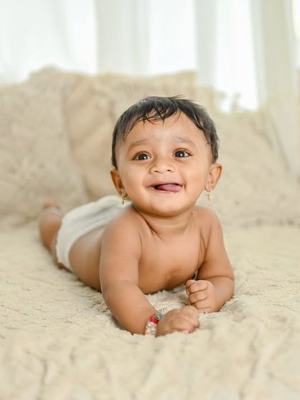 A duplicate of image 129, a simple and sweet shot of a crawling baby.