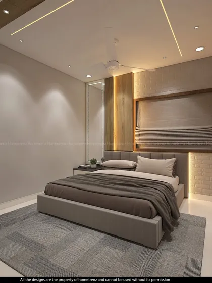A guest bedroom with a simple, clean design. The textured wall behind the bed and the wood-framed window add subtle points of interest.