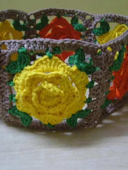 The side view of the rose granny square basket.