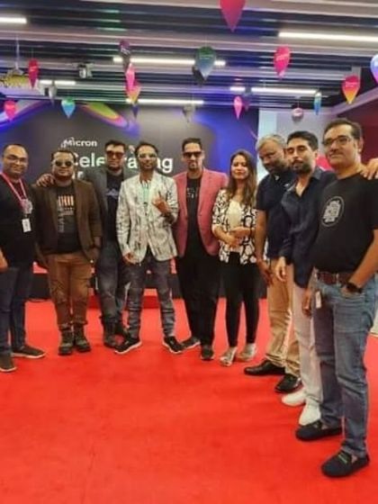 A group photo with the organizing team at Micron Technology after a super fun gig.