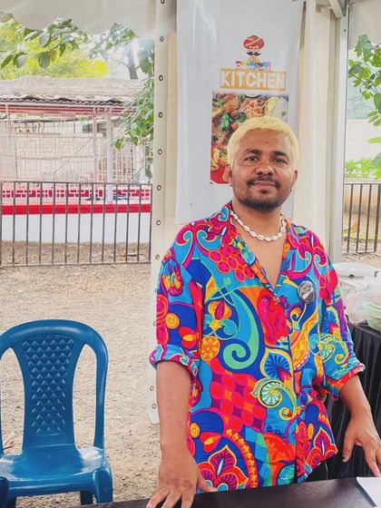 Another shot of Ankur at our food stall. These events allow us to connect directly with our customers and share our passion for food.