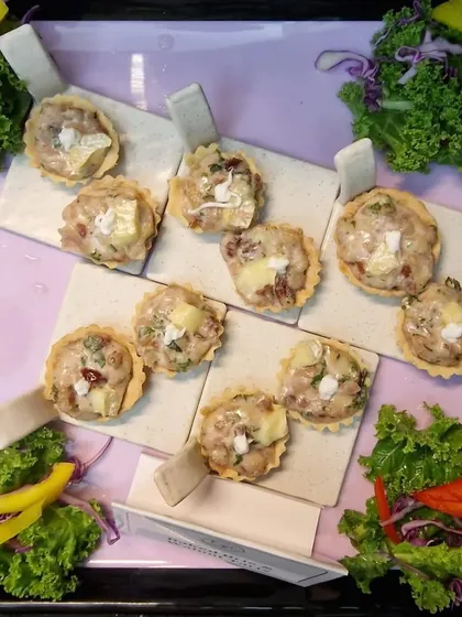 Take a seat, grab a treat! Our baked brie and walnut tarts are the perfect way to welcome guests, offering a warm and savory bite.