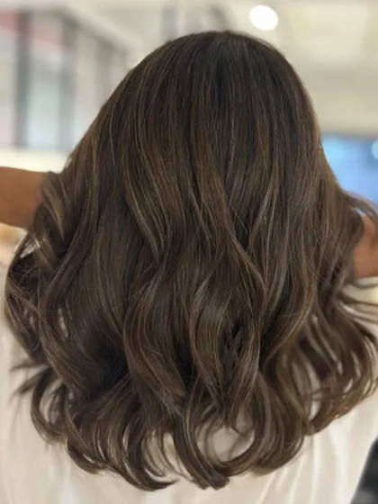 A fresh cut and color can do wonders. We went from warm to cool tones and added textured layers for a completely new look that's perfect for summer.