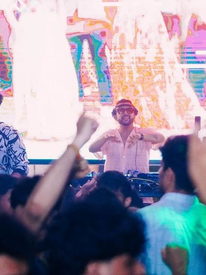 Me in the zone, with the crowd's hands up in front of me. This is the connection that fuels the night.