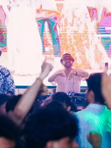 Me in the zone, with the crowd's hands up in front of me. This is the connection that fuels the night.