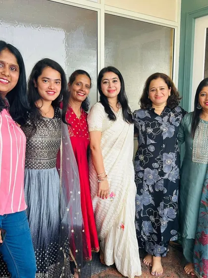 Posing with members of our yoga family during a celebration. These are the moments I cherish.