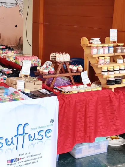 Another angle of my setup, featuring my cupcake soaps and a display of my other skincare products like creams and micas.