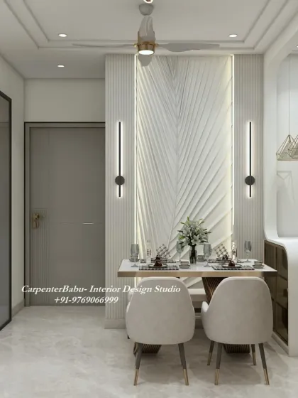 A dining area at Dosti West Country, Thane, featuring a stunning wall with a 3D leaf-patterned relief. The design feels organic, modern, and incredibly elegant.