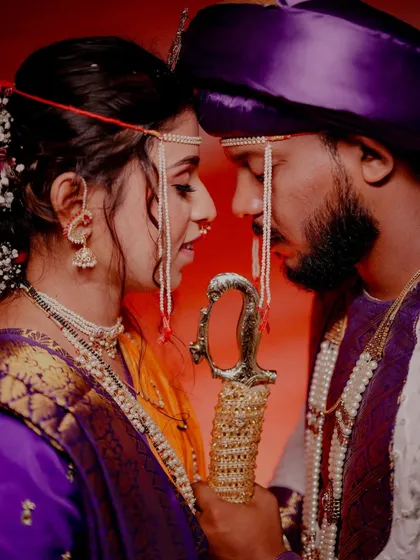 An intimate portrait of a Maharashtrian couple, showcasing the rich cultural details and the quiet connection between them. My experience with traditional weddings ensures every significant element is beautifully documented.