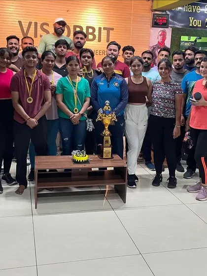 Posing with the team and our trophies. Every victory is a shared one.
