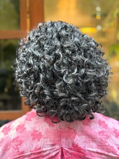 More examples of my short curly haircuts, from bobs to layered chops, each one personalized to the client's curl pattern and face shape.