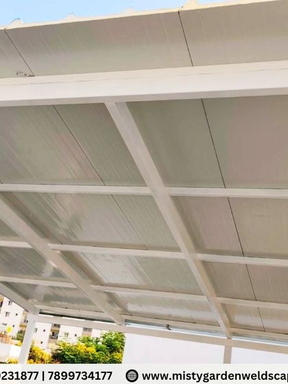A close-up of the puff sheet roofing on a white metal frame. This combination provides a clean, bright, and insulated ceiling for the outdoor space, making it usable and comfortable in any season.