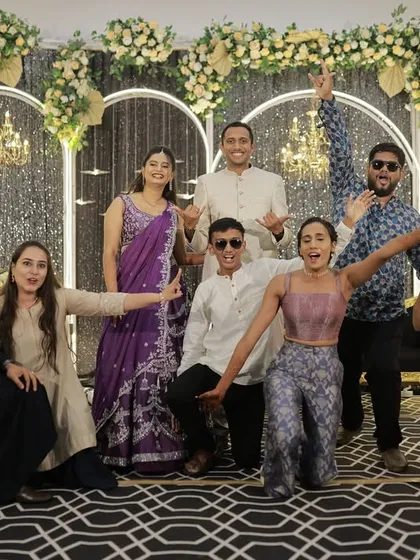 Good vibes only with the whole crew. Capturing these fun group moments is a key part of a memorable sangeet night.