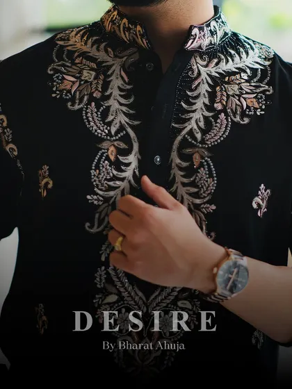 The soul of my work is in the details. This close up view reveals the meticulous embroidery on a custom black kurta. Each thread is purposefully placed to create texture and depth, transforming the garment into a piece of luxury craftsmanship.