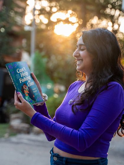 She's here! Celebrating the release of my second romance novel, "Can't Help Faking in Love." This photo was taken at sunset, and it feels just as magical as the moment.